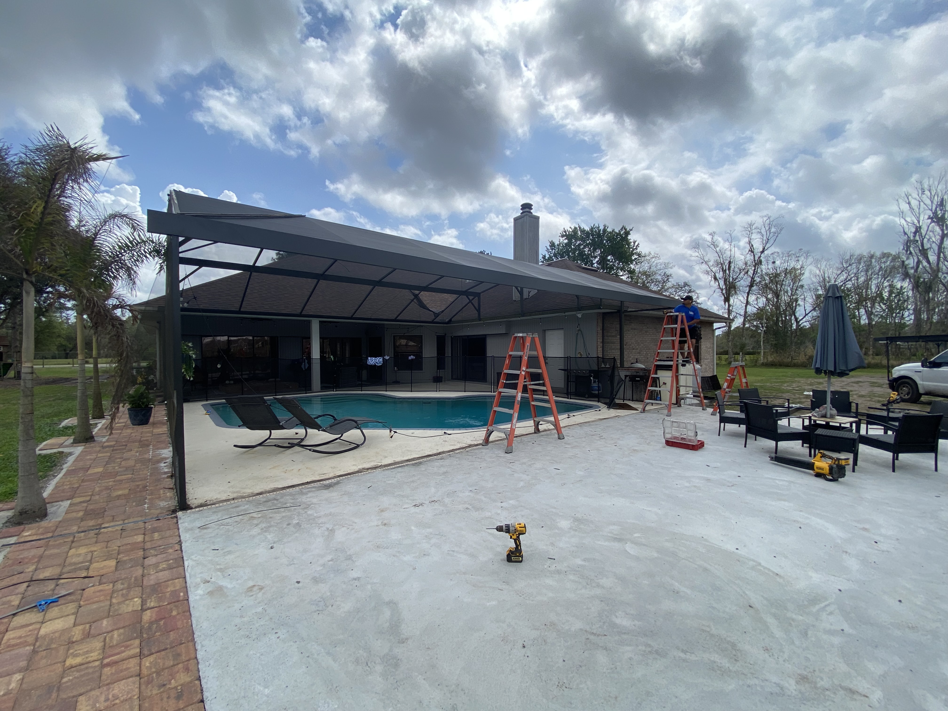 Pool cage install in progress
